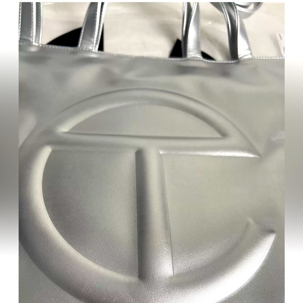 Large Tel far bag Natalie silver. Great condition brand new.